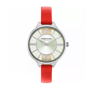 Jam tangan wanita KENNETH COLE KCNY50538004 dengan tali kulit merah dan dial transparan bergaya feminin modern.
